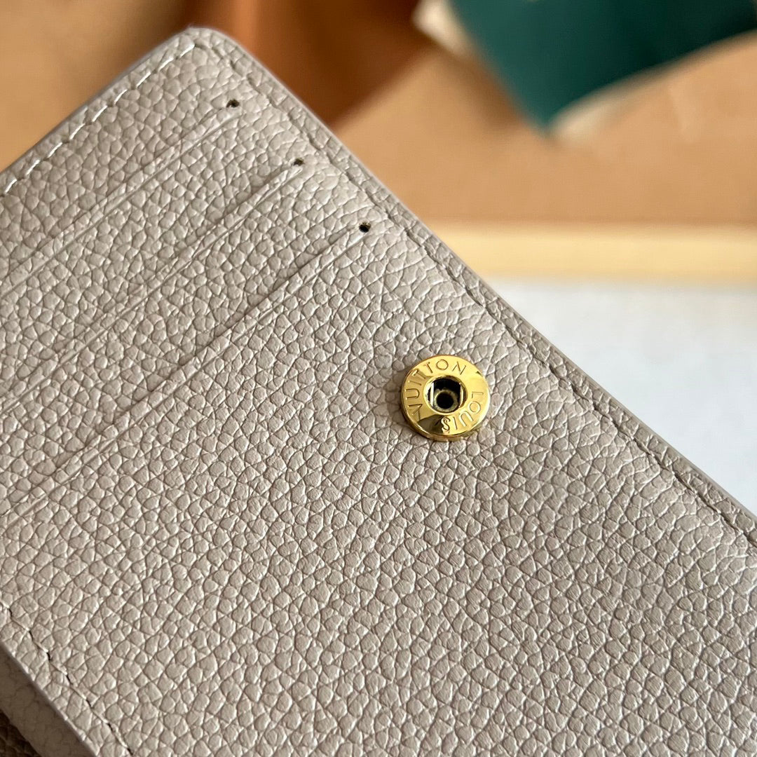 Cléa Compact Leather Wallet - M82370