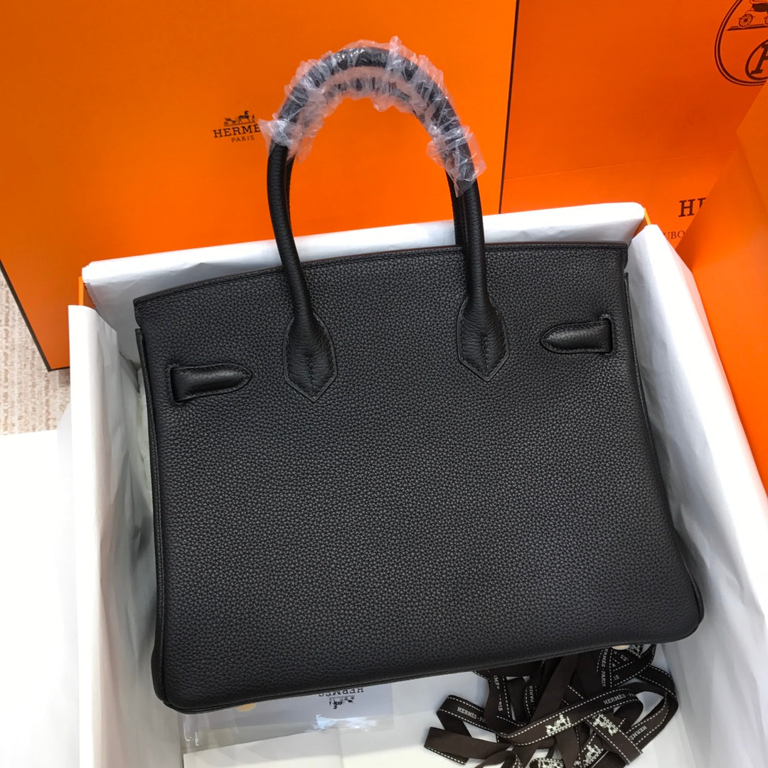 Handmade black Togo leather top handle bag 30cm detail view 2