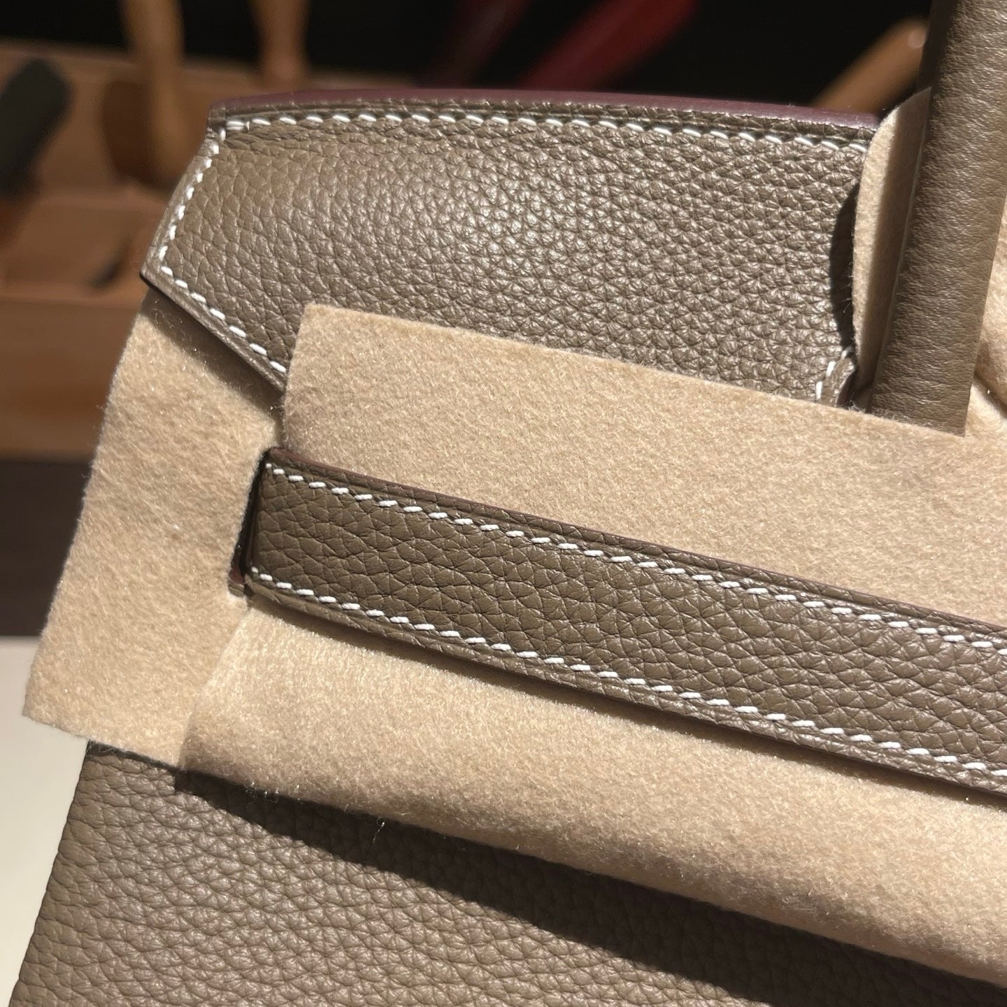 Handmade etoupe Togo leather top handle bag 30cm detail view 3