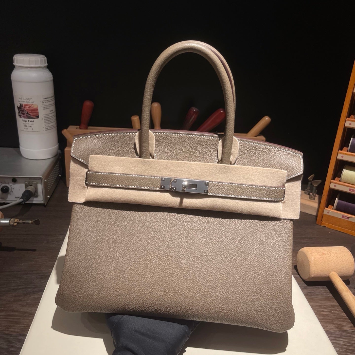 Handmade Etoupe Togo leather top handle bag with silver hardware 30cm detail view 2