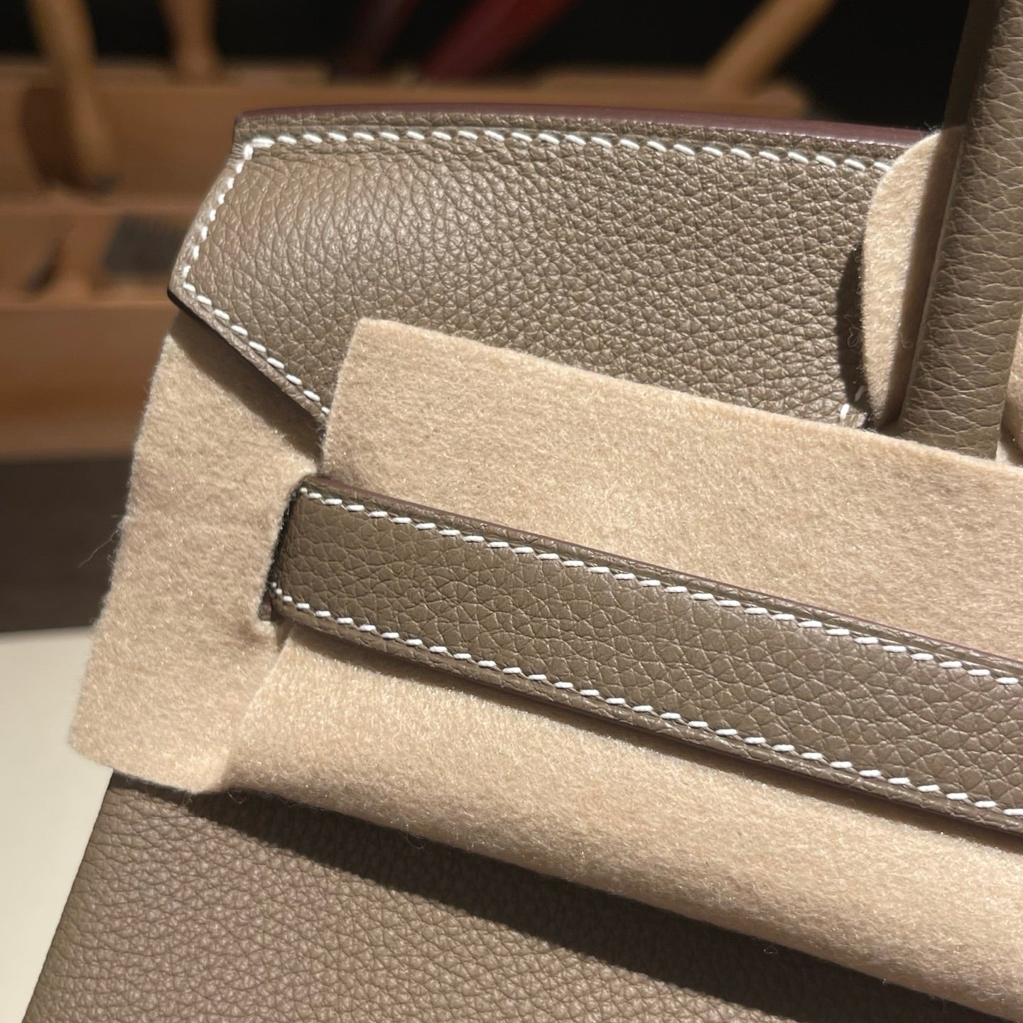 Handmade Etoupe Togo leather top handle bag with silver hardware 30cm detail view 5