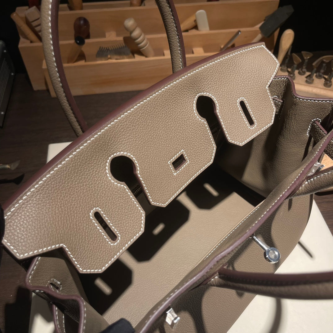 Handmade Etoupe Togo leather top handle bag with silver hardware 30cm detail view 9