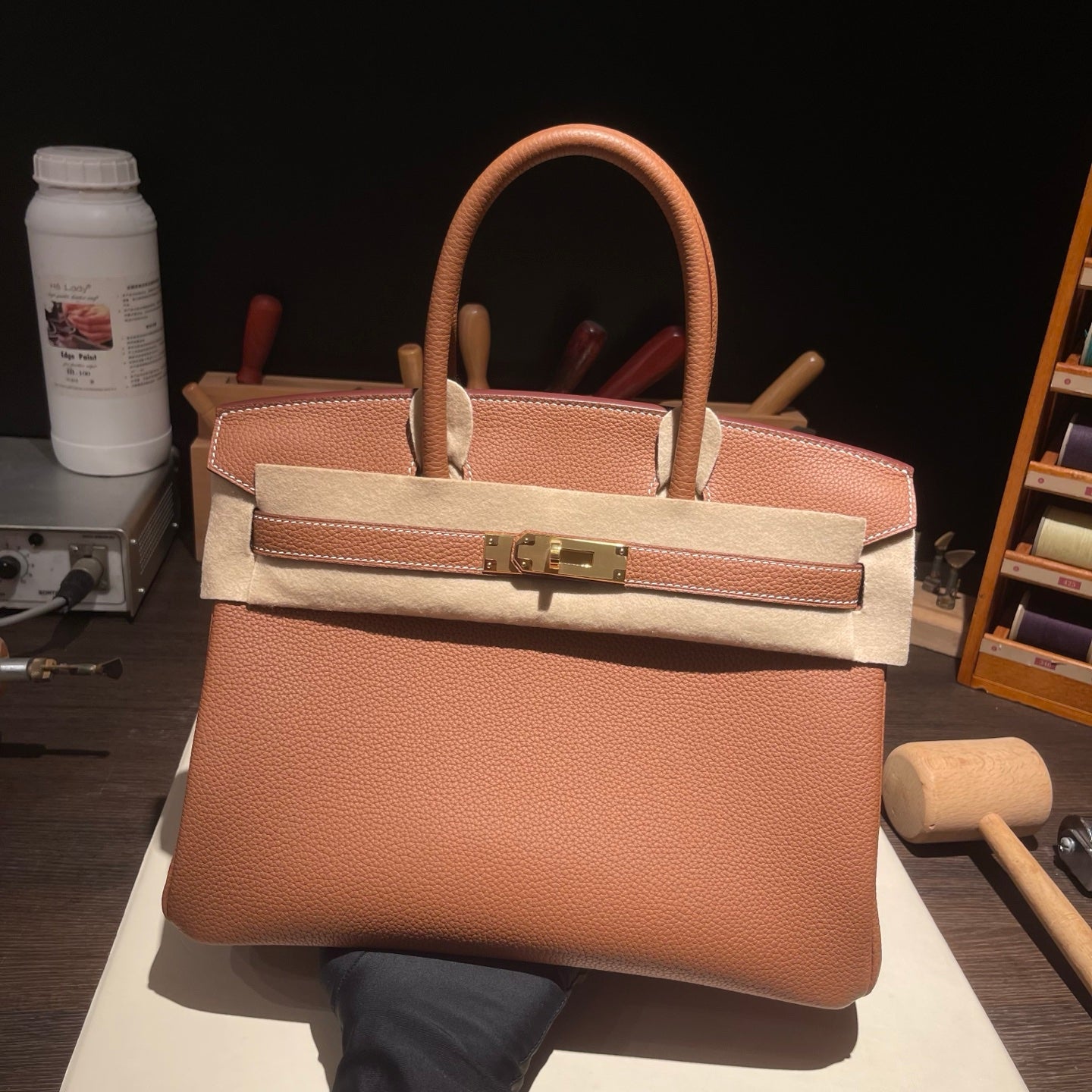 Handmade Gold Brown Togo leather top handle bag with gold hardware 30cm detail view 2