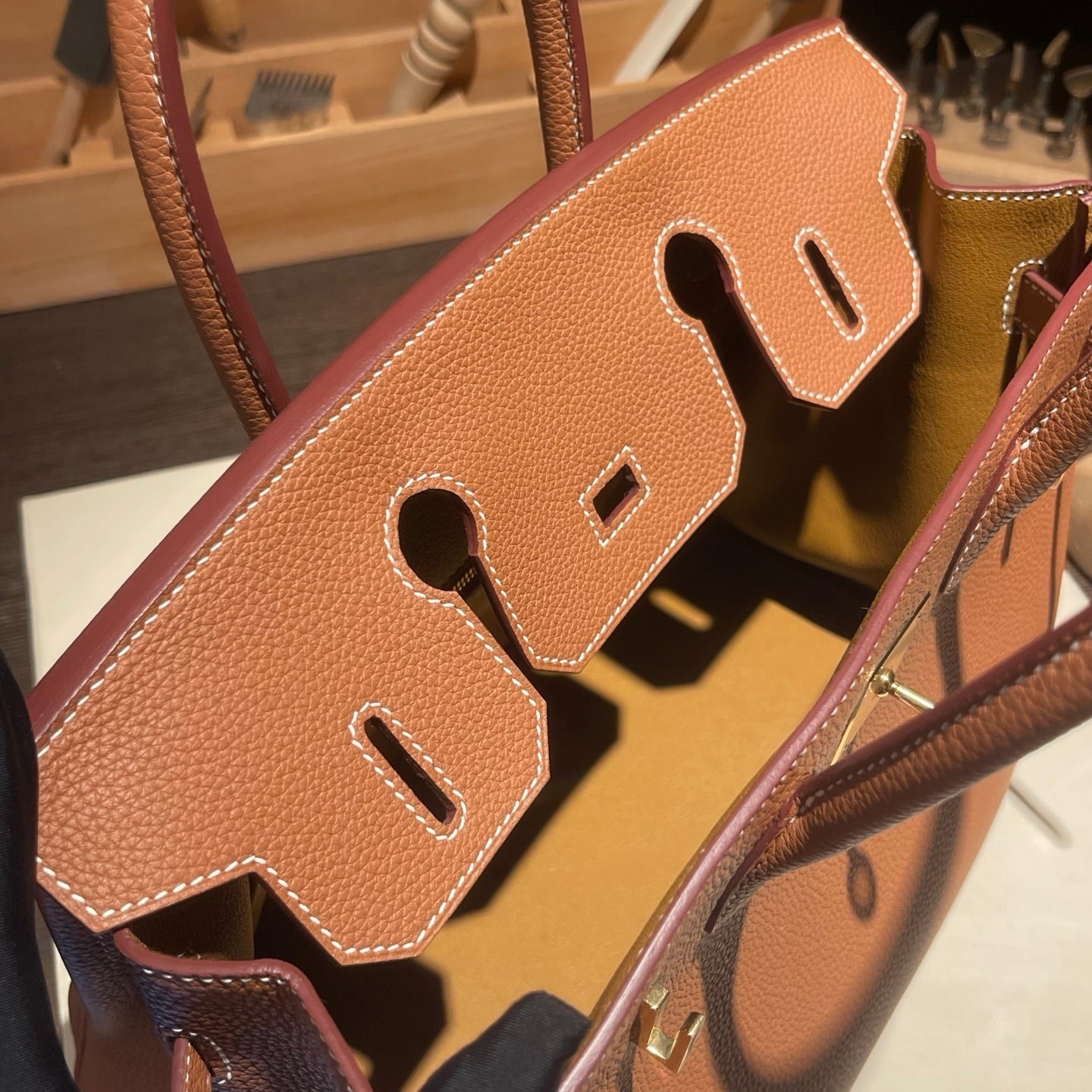 Handmade Gold Brown Togo leather top handle bag with gold hardware 30cm detail view 8