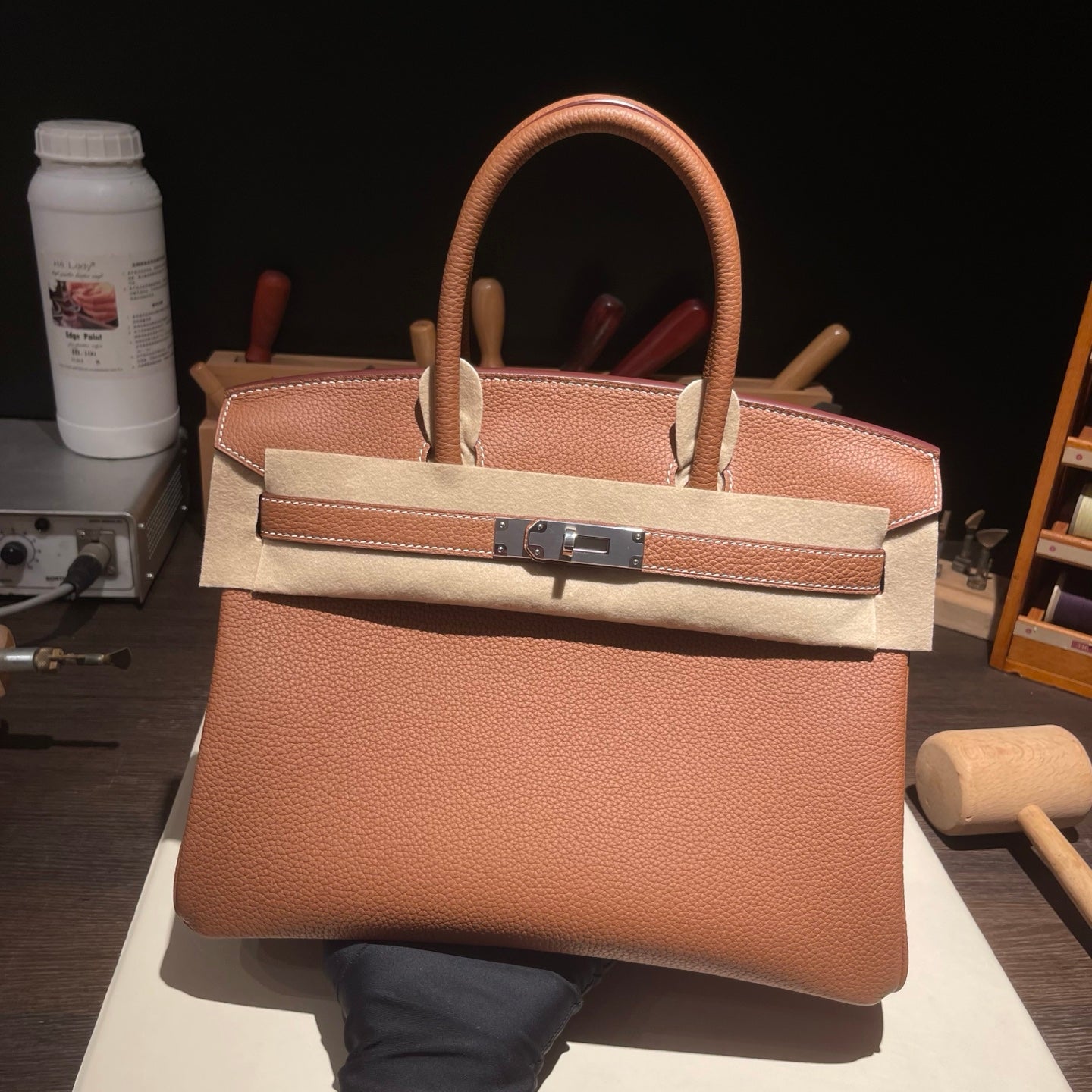 Handmade Gold Brown Togo leather top handle bag with silver hardware 30cm detail view 2