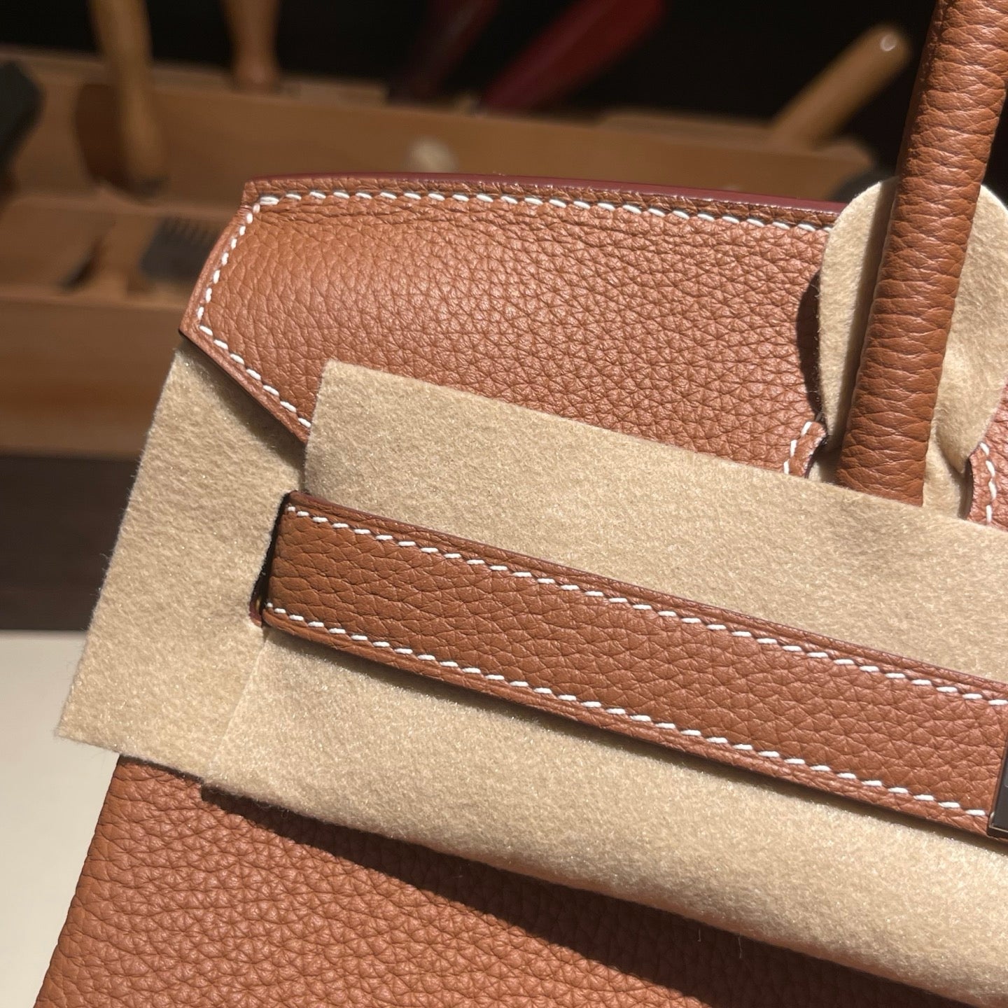 Handmade Gold Brown Togo leather top handle bag with silver hardware 30cm detail view 3