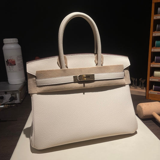 Handmade Cream White Togo leather top handle bag with gold hardware 30cm detail view 1