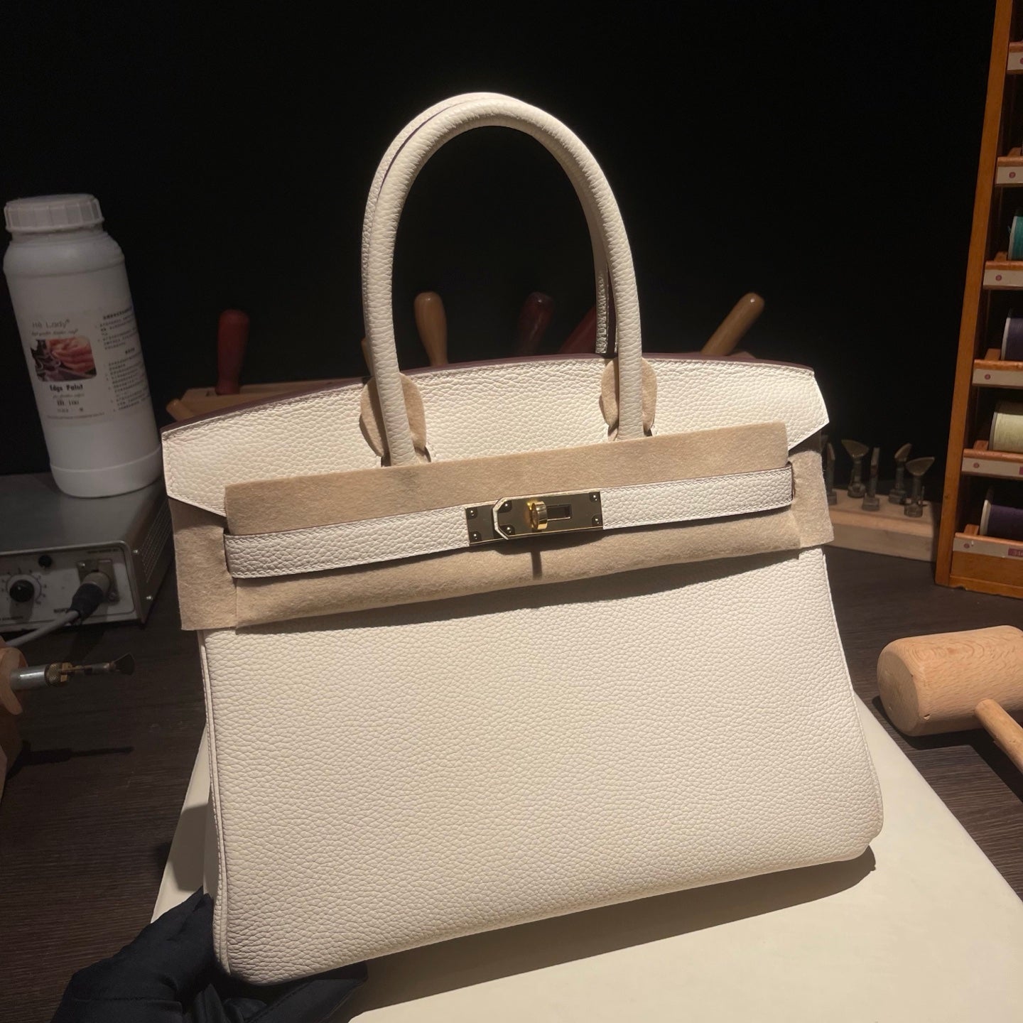 Handmade Cream White Togo leather top handle bag with gold hardware 30cm detail view 2
