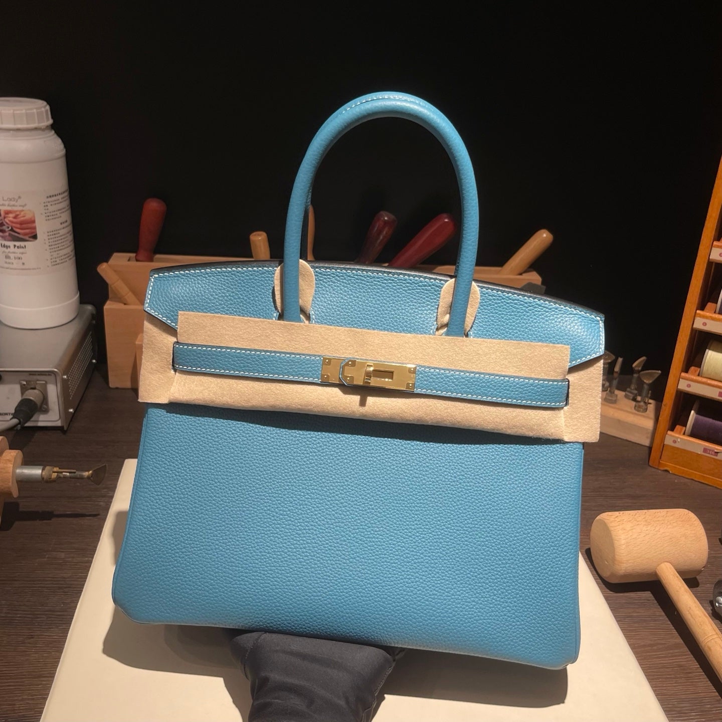 Handmade Denim Blue Togo leather top handle bag with gold hardware 30cm detail view 2