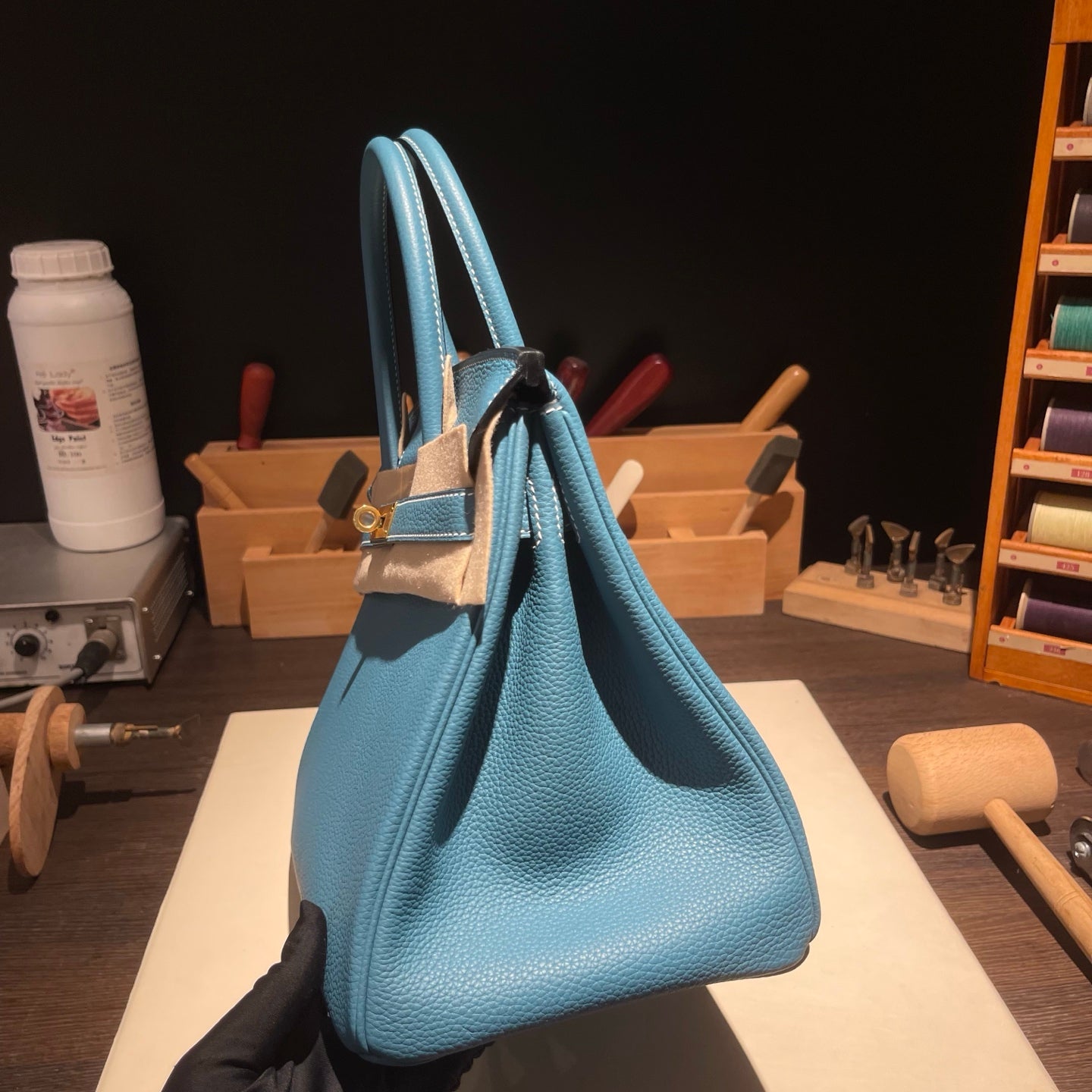 Handmade Denim Blue Togo leather top handle bag with gold hardware 30cm detail view 6