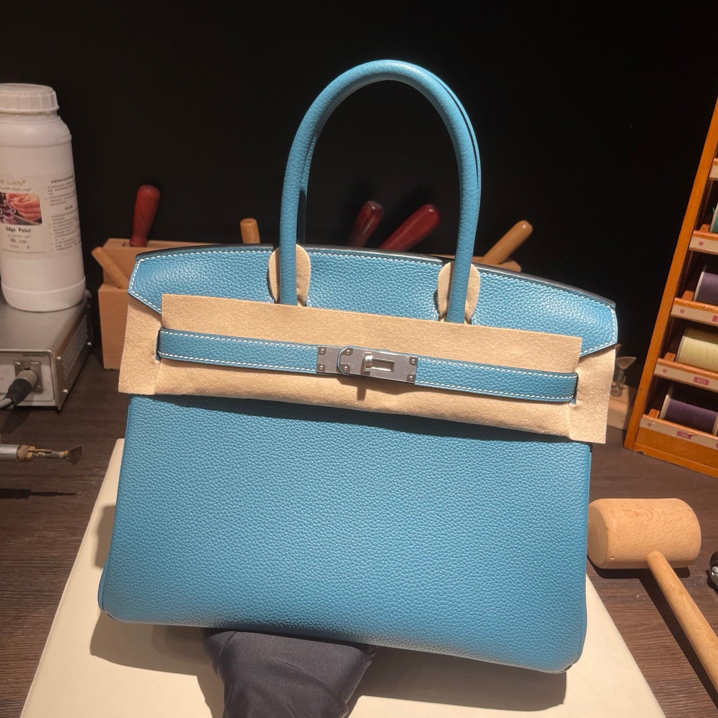 Handmade Denim Blue Togo leather top handle bag with silver hardware 30cm detail view 2