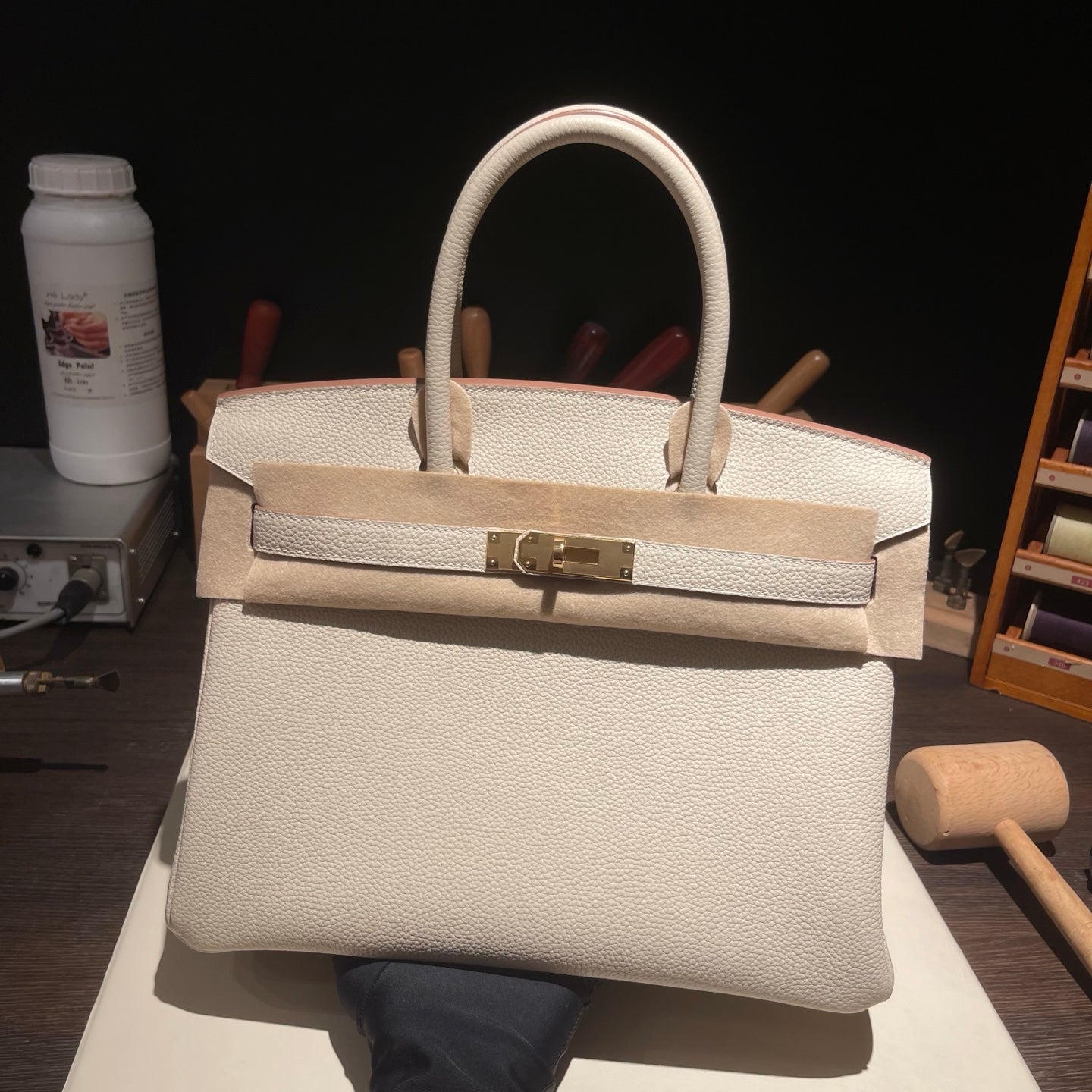 Handmade Milkshake White Togo leather top handle bag with gold hardware 30cm detail view 2