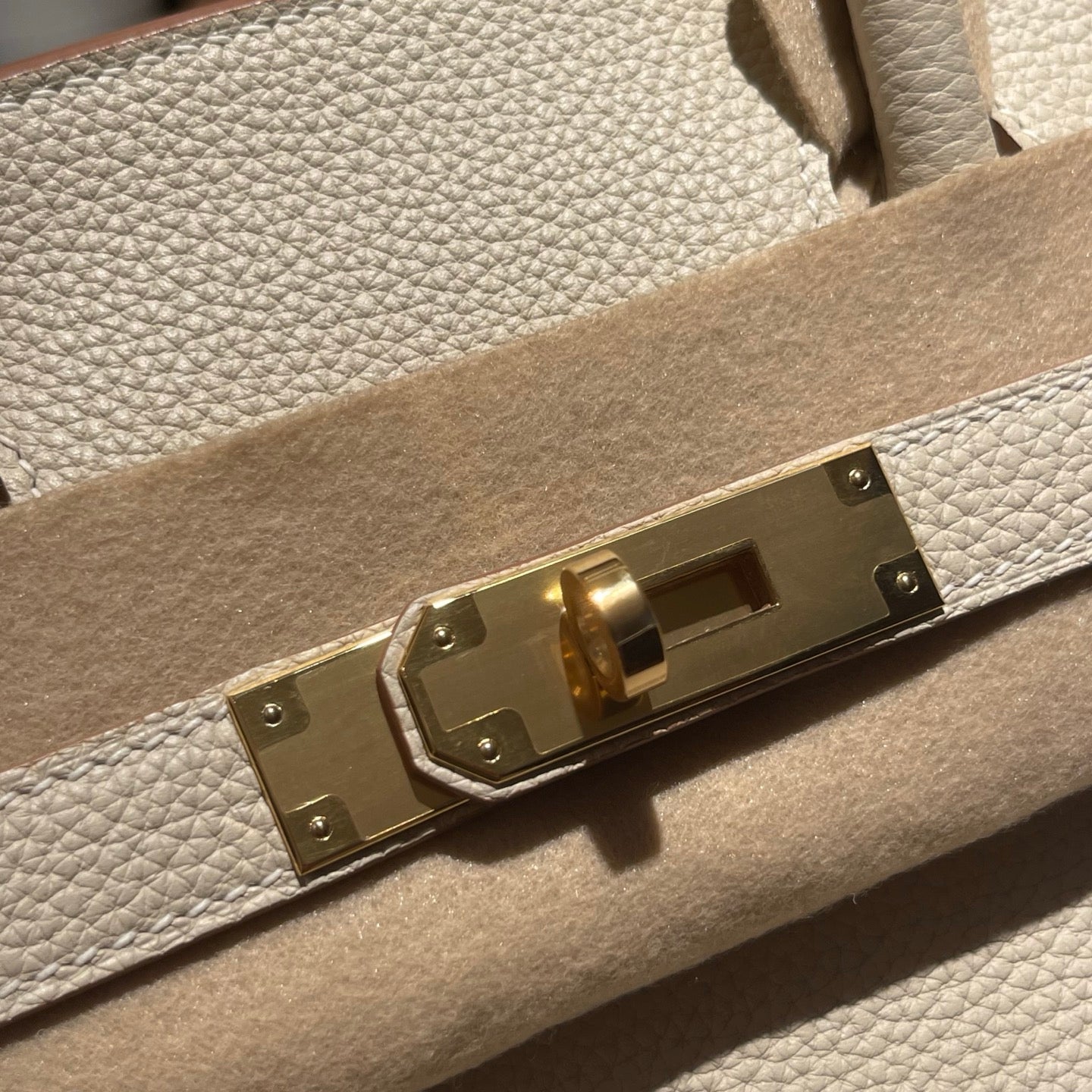 Handmade Milkshake White Togo leather top handle bag with gold hardware 30cm detail view 4