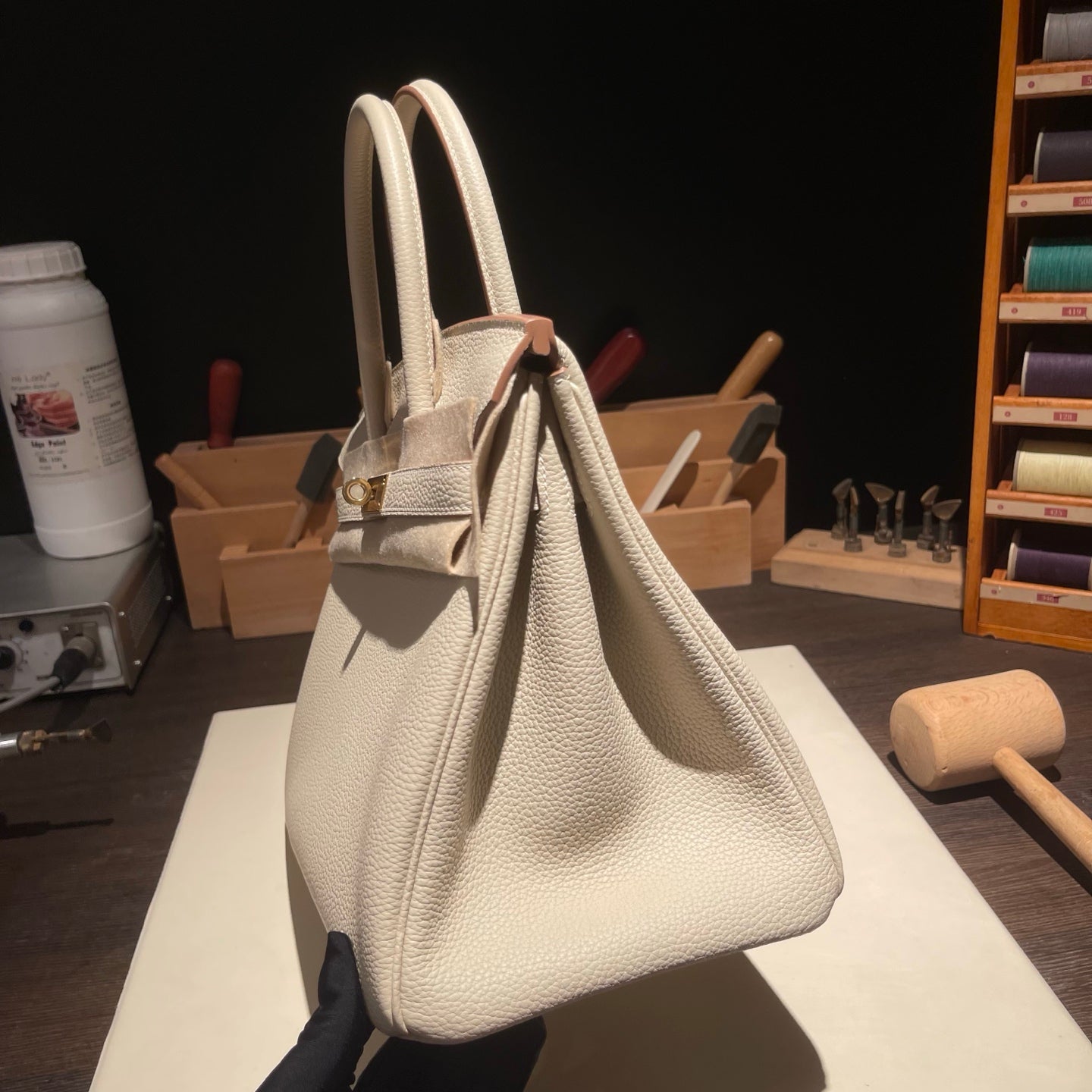 Handmade Milkshake White Togo leather top handle bag with gold hardware 30cm detail view 5