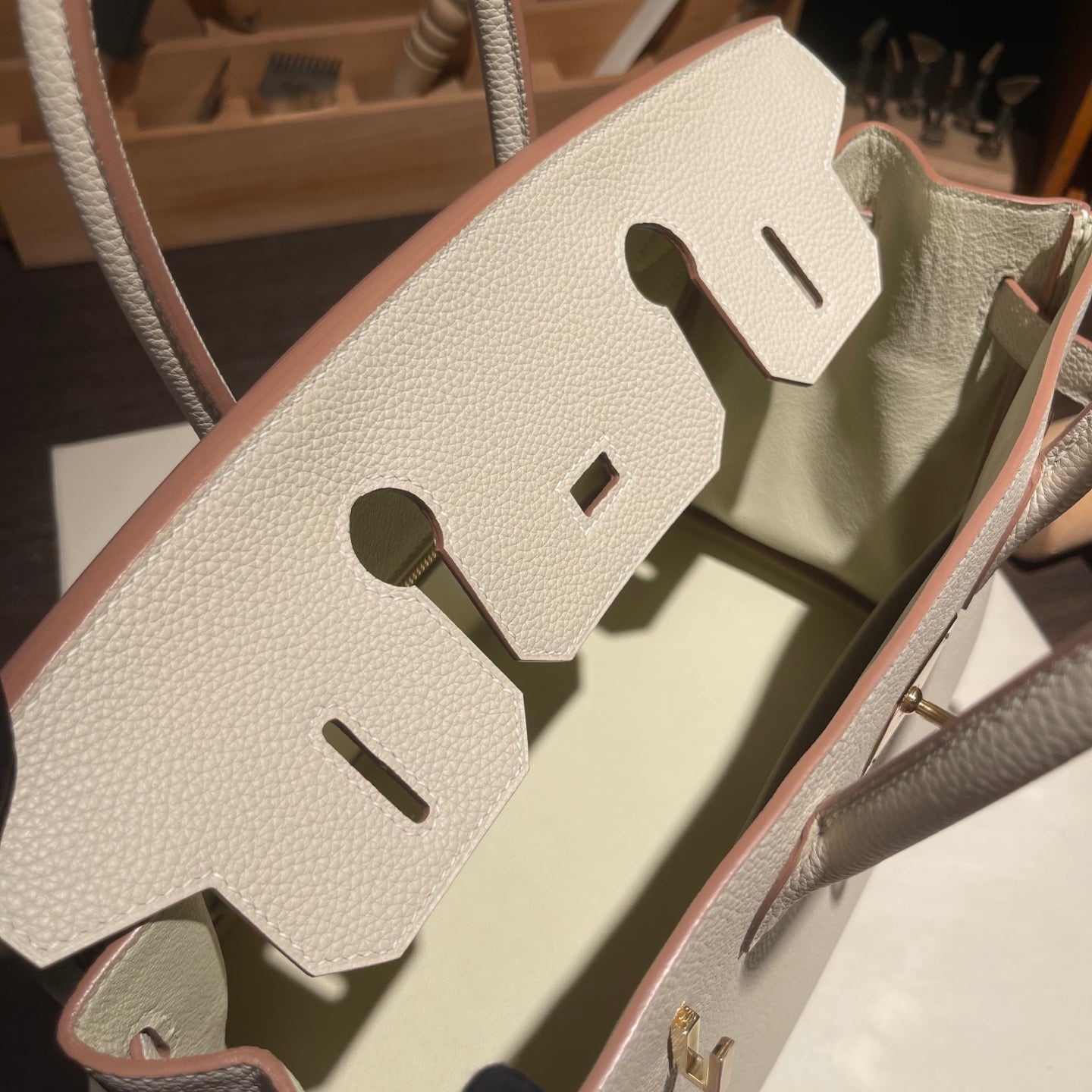 Handmade Milkshake White Togo leather top handle bag with gold hardware 30cm detail view 9