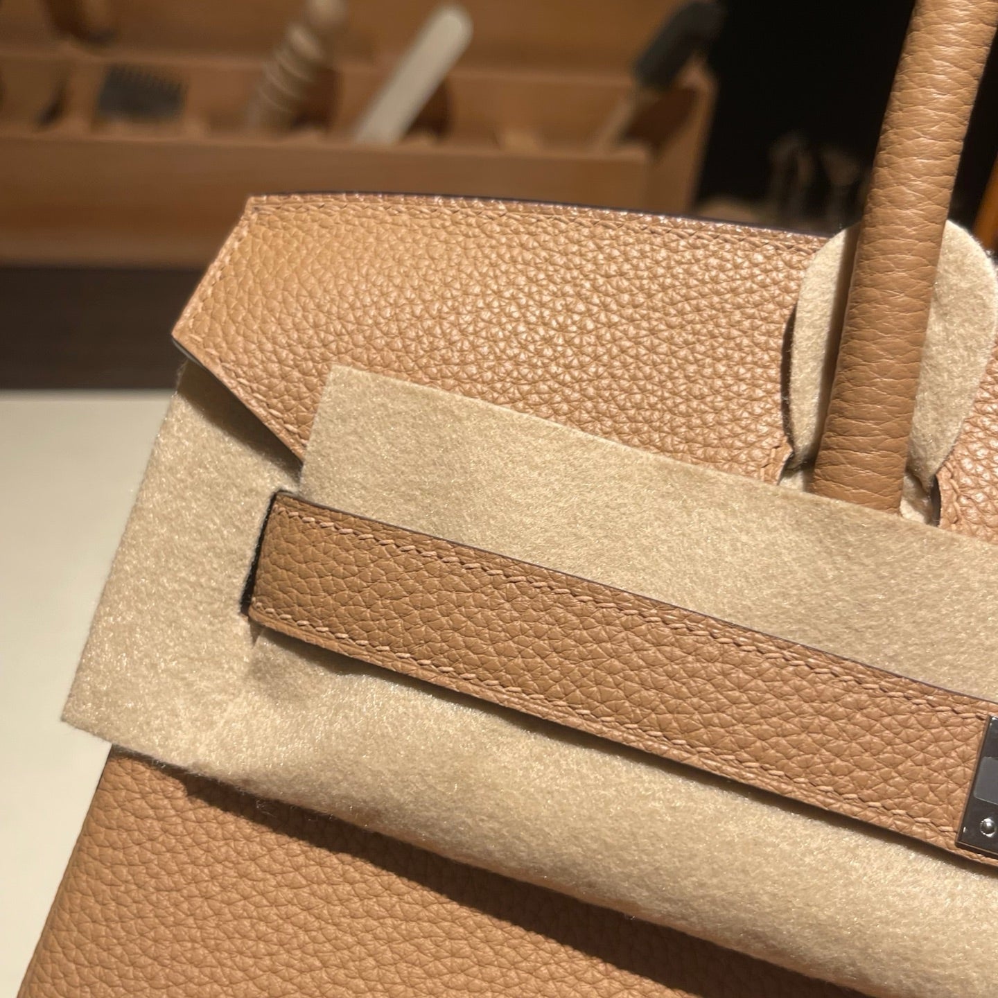 Handmade Milk Tea Togo leather top handle bag with silver hardware 30cm detail view 3
