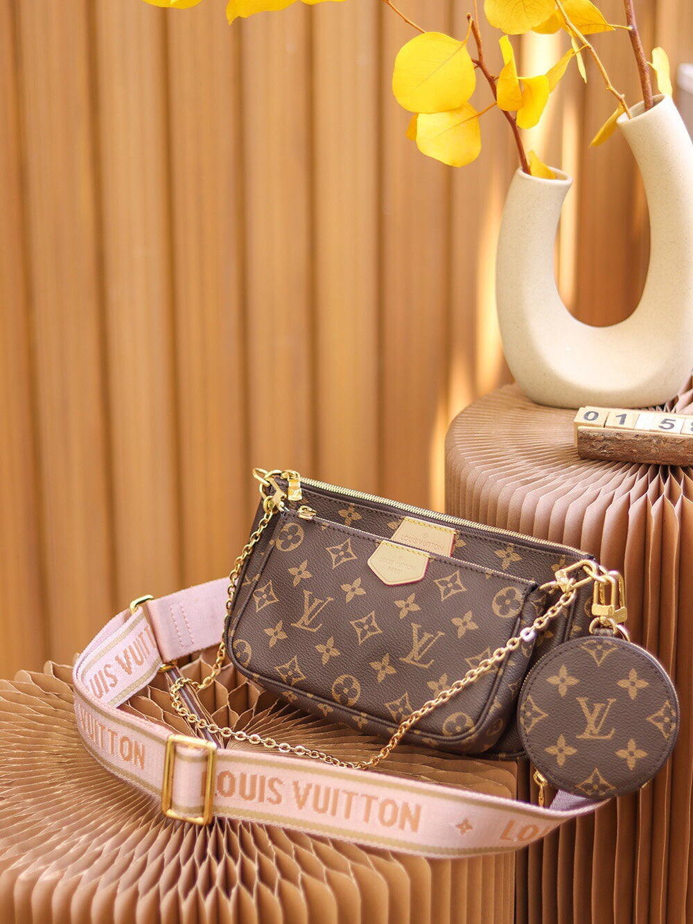 Multi Pouch Crossbody Bag M44840