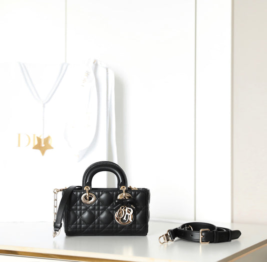 Bolso cruzado mini acolchado con asa superior - Negro