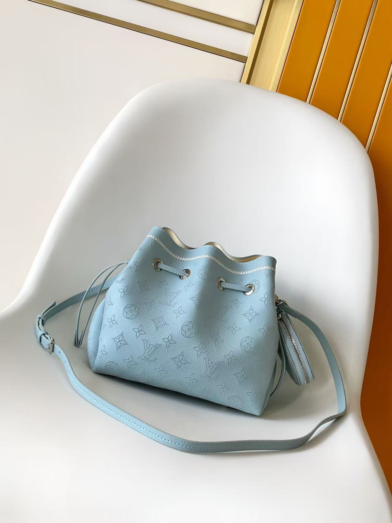 Perforated Leather Bucket Bag M28885