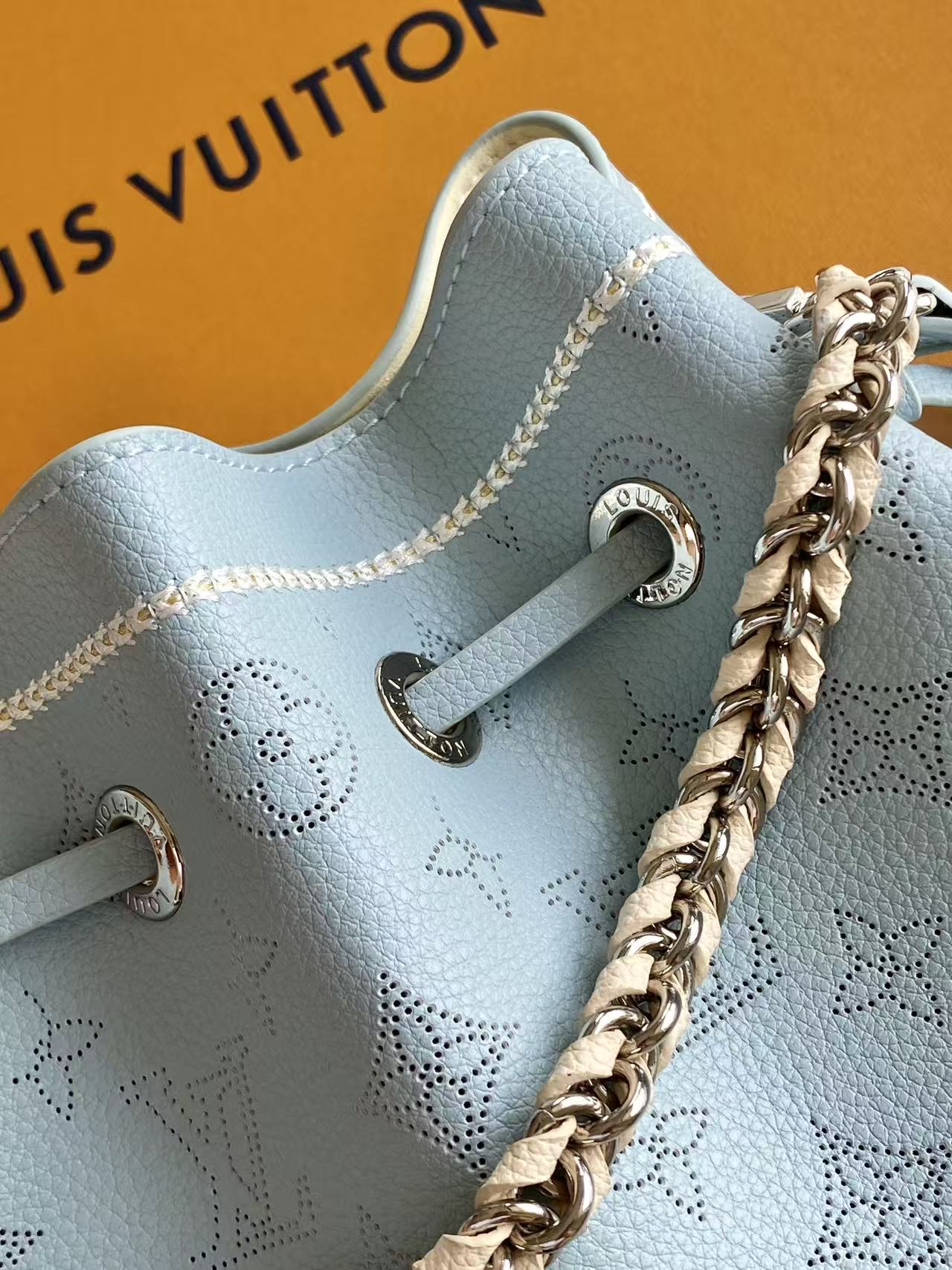 Perforated Leather Bucket Bag M28885