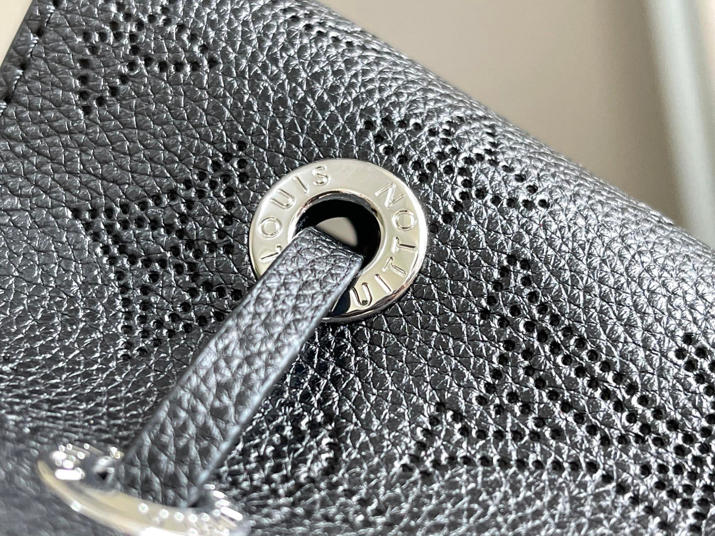 Perforated Leather Bucket Bag M57070